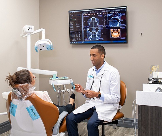 Doctor G talking to patient about Nu Smile Aligner process