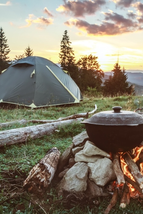 Camp site with tent and grill