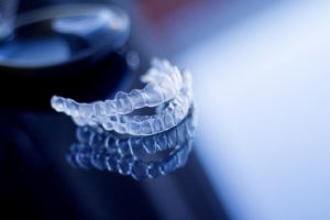 Aligners for Invisalign and Nu Smile on reflective surface